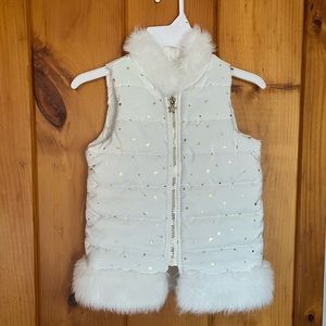 Little girl puffer vest.